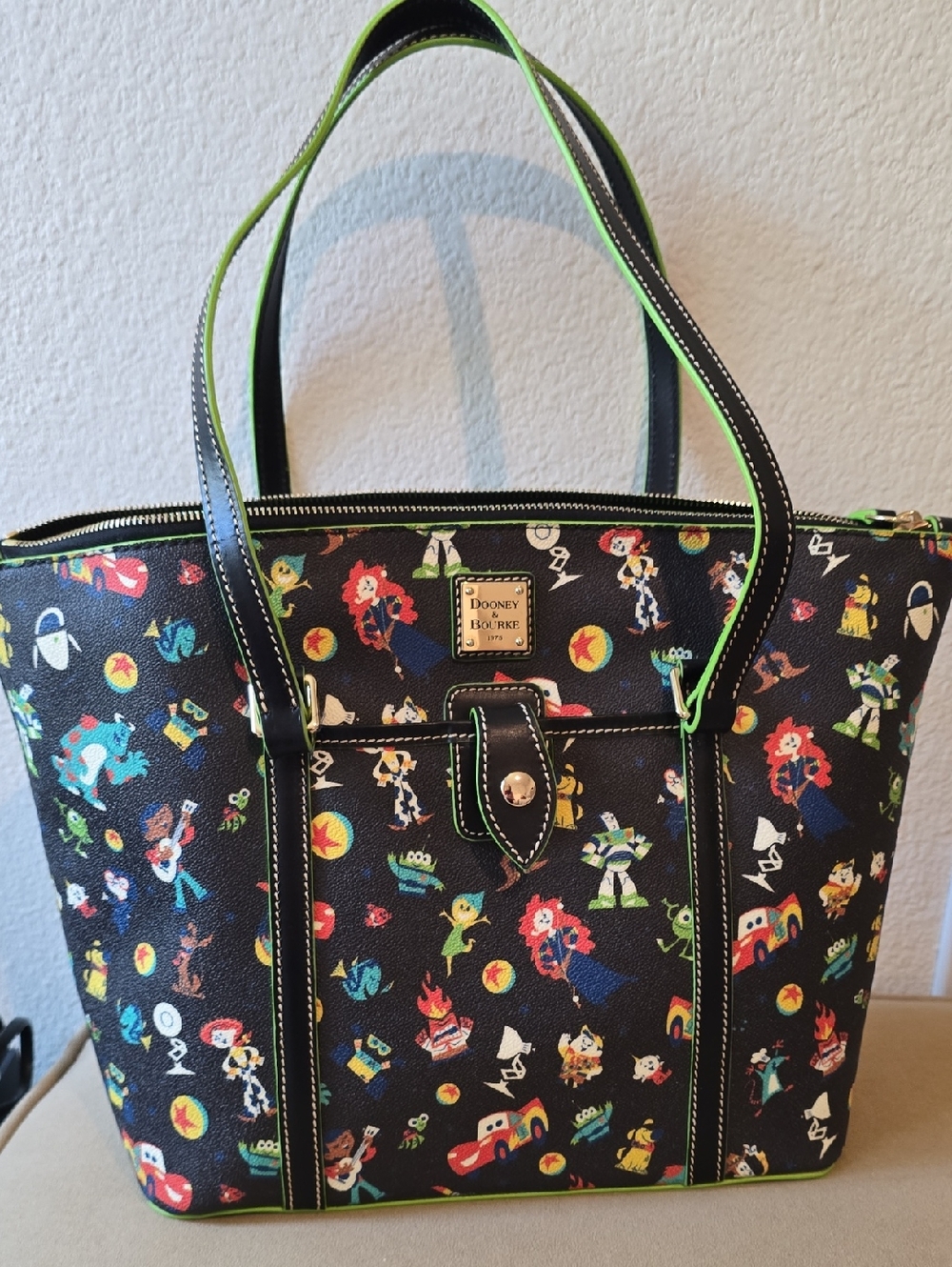 Dooney & Bourke Black Toy Story Print Tote with Neon Green Trim